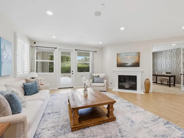 Cozy fireplace and doors to office