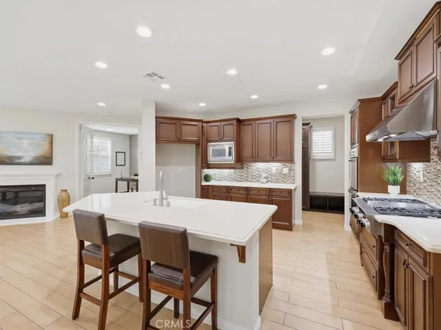 Oversized island with bar top seating