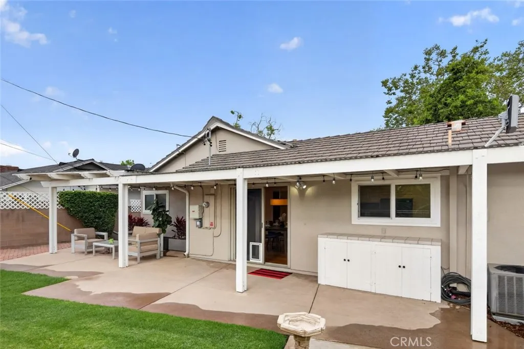 Relax and enjoy the spacious backyard with grass and patios for pets and family to play all year round.