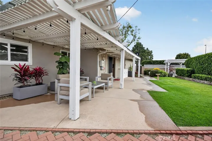 Enjoy the outdoor lush green backyard on large lot and private spa. Wow two patios!
