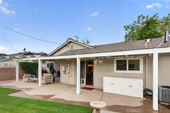 Relax and enjoy the spacious backyard with grass and patios for pets and family to play all year round.