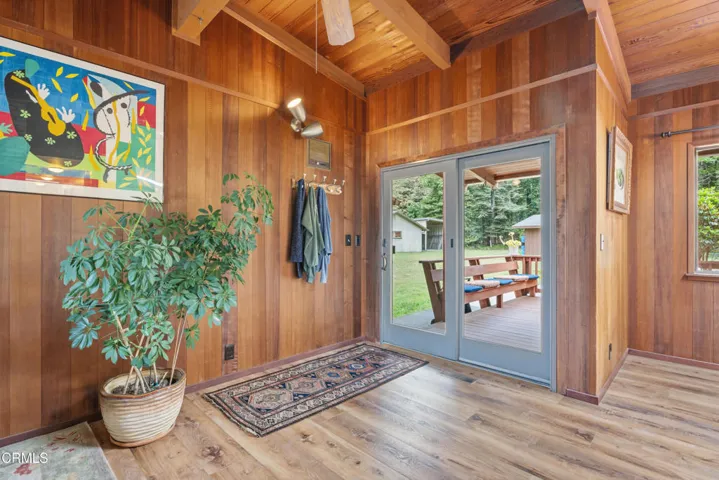 LIVING ROOM TO DINING AND REAR DECK