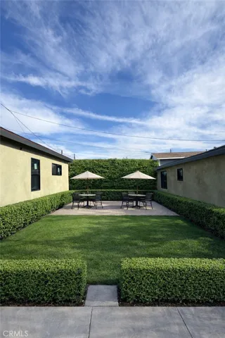 Virtual yard image, grass and boxwood now installed.
