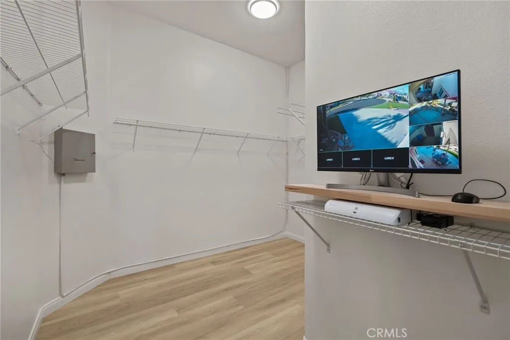 Primary walk-in closet with integrated security system