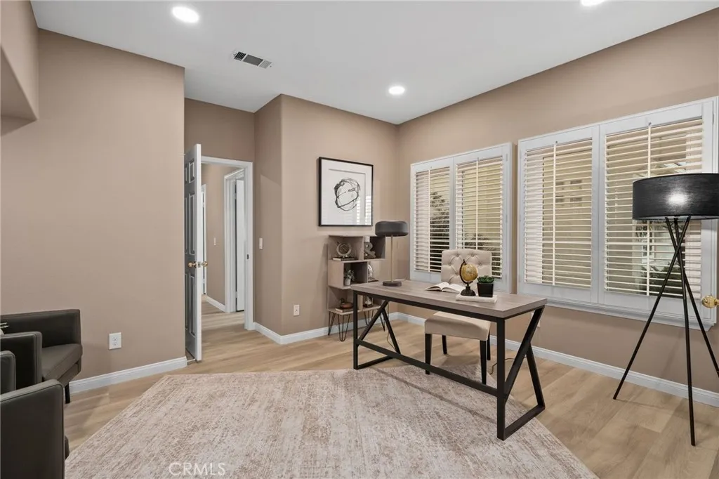 front bedroom with dual door entry used as office