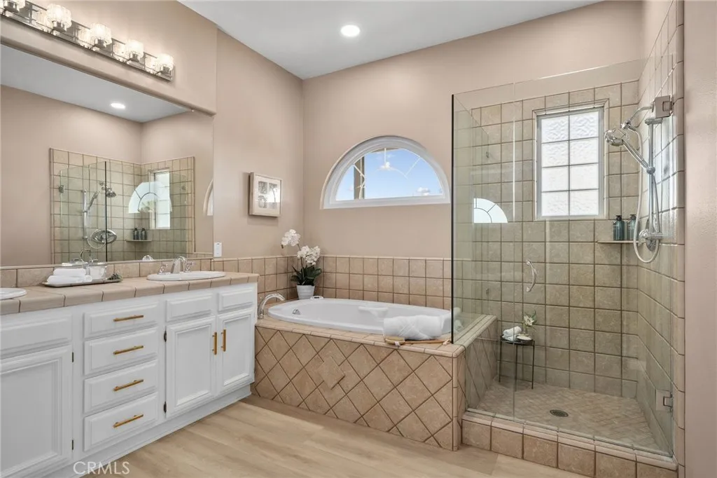 dual sink vanity, walk-in shower