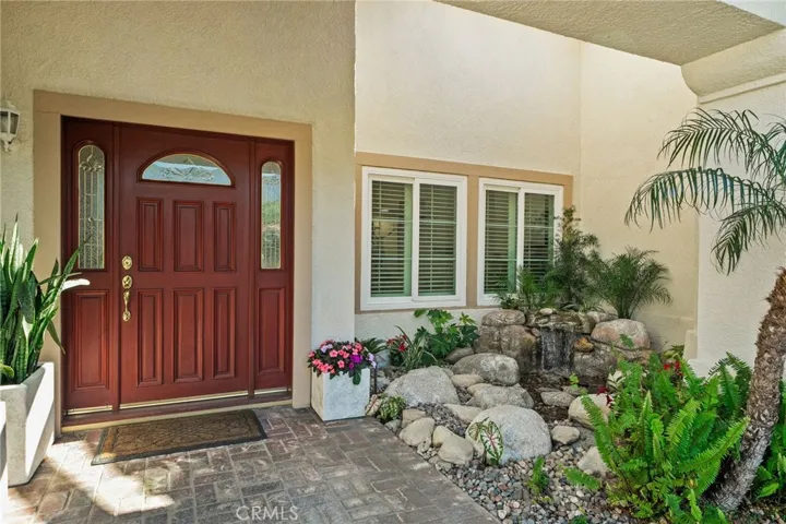 expanded front door entry and water feature