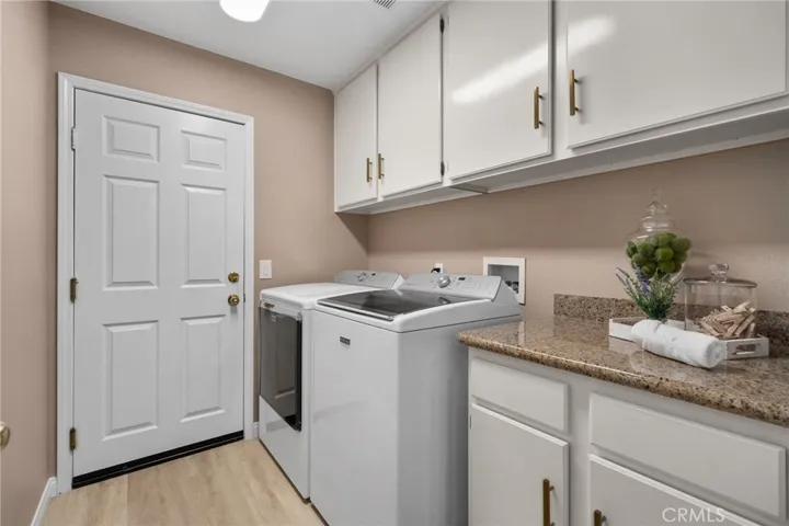 laundry room with included washer/dryer