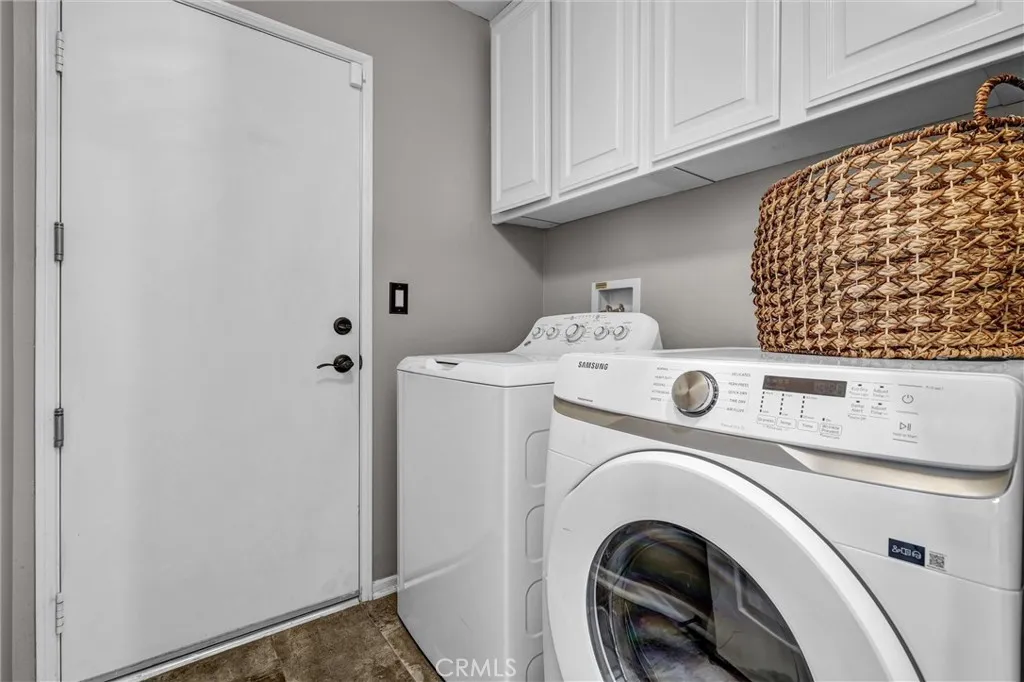 Inside Laundry Room with Direct Access to Garage