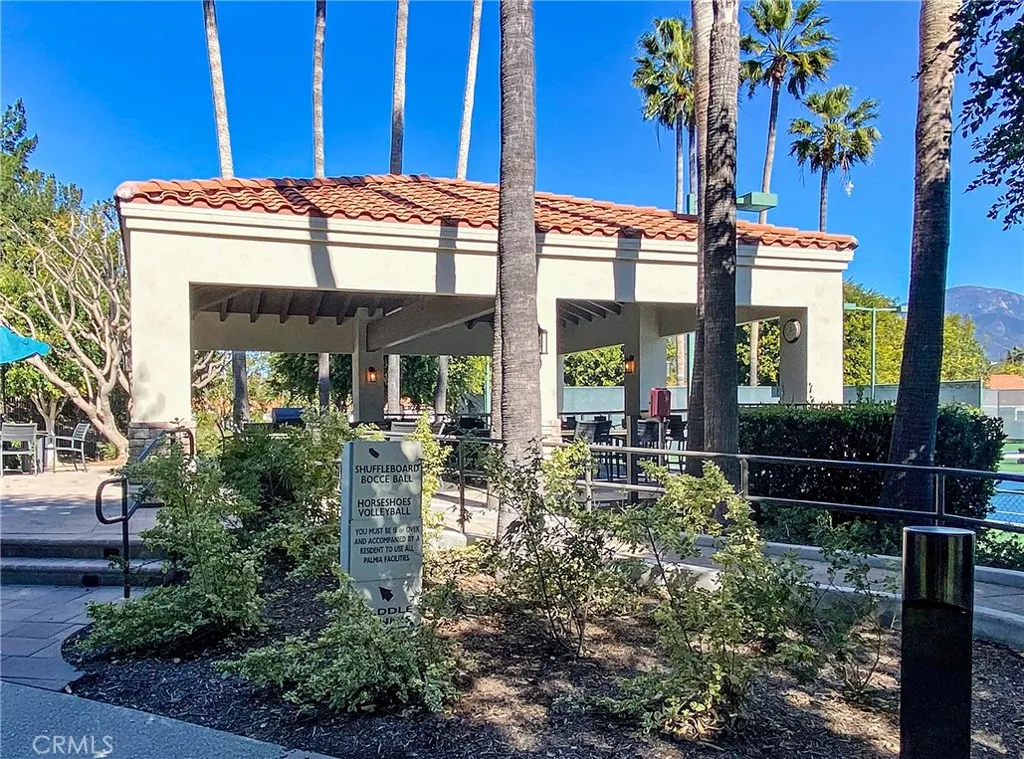 Covered Veranda with Tables and Bar-b-que