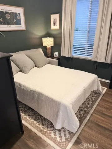 Guest Bedroom with mirrored wardrobe 
