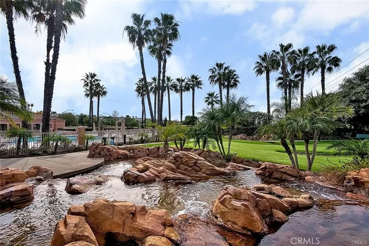Putting Green with Beautiful Waterfall Landscaping