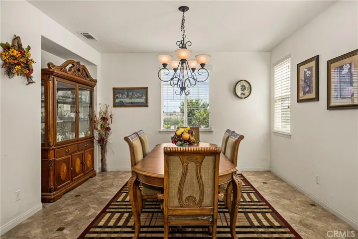 Formal Dining Room has View to Backyard.