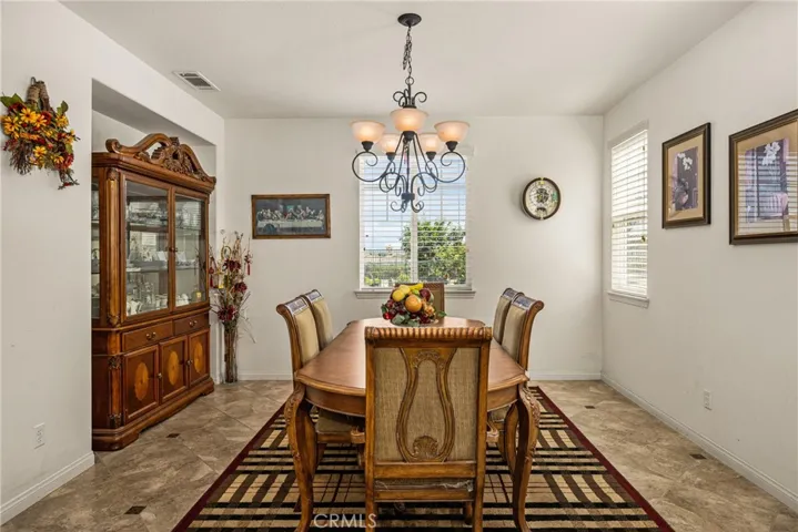 Formal Dining Room has View to Backyard.