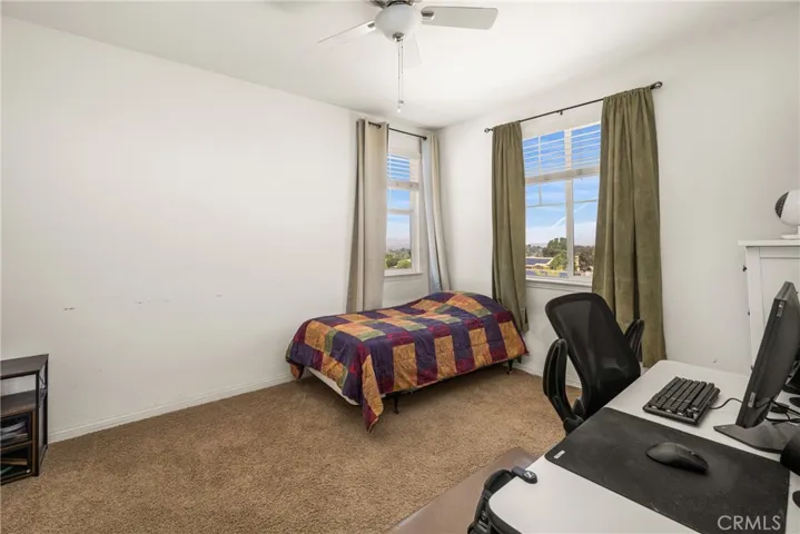 Upstairs Corner Bedroom facing Backyard.