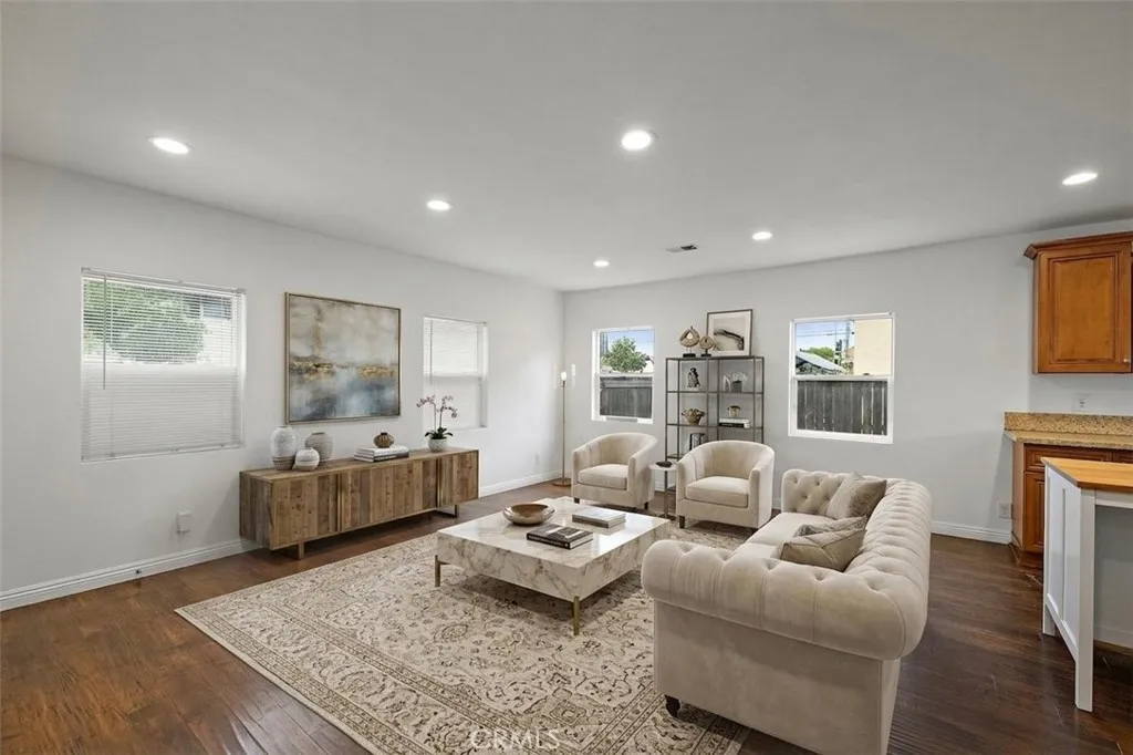 This photo has been digitally altered to include furniture and decor. This photo is virtually staged.