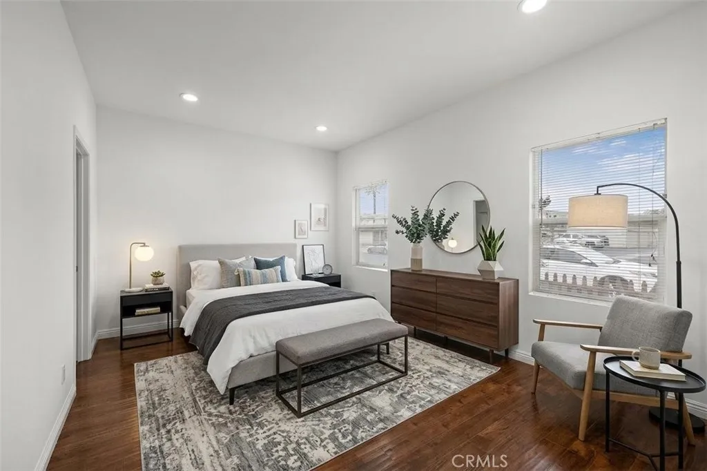 Primary bedroom -This photo has been digitally altered to include furniture and decor. This photo is virtually staged.
