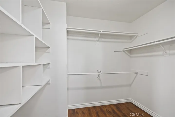 Here is a view of the walk-in primary closet