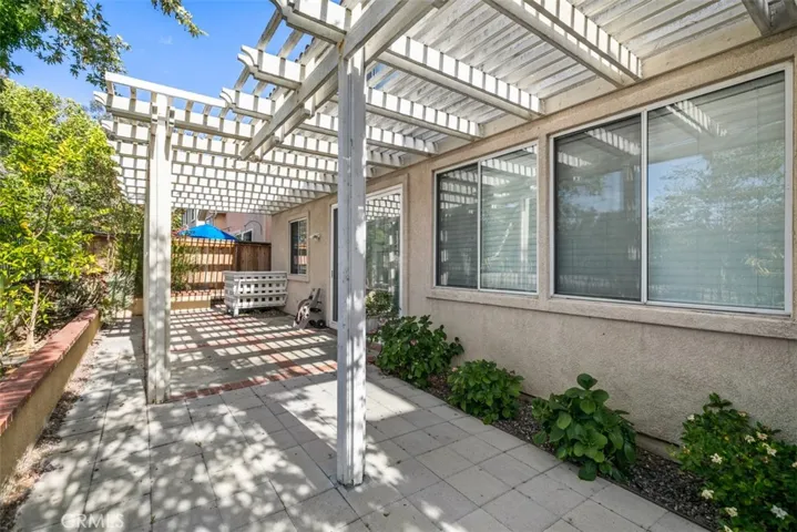 The backyard also has your own private patio cover