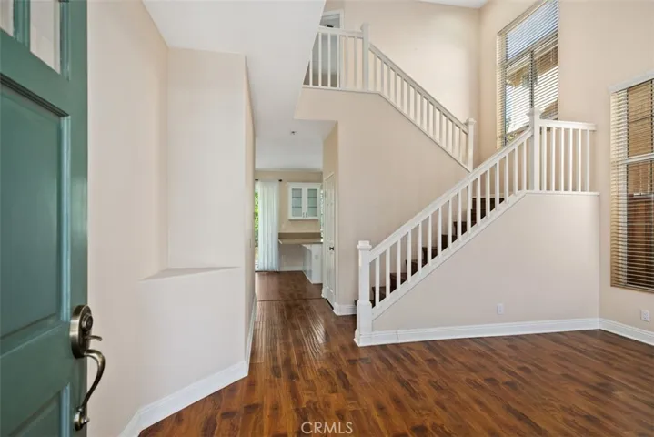 This is the view from the front door with beautiful wood engineered flooring throughout