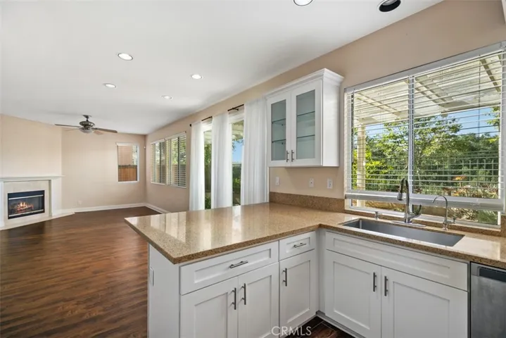 This view shows how light and bright the kitchen and family room are