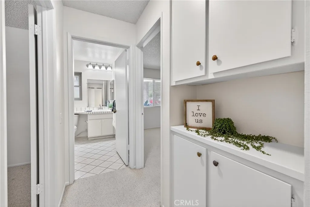 Hallway leading into the bedroom and bathroom area
