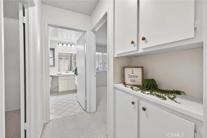 Hallway leading into the bedroom and bathroom area