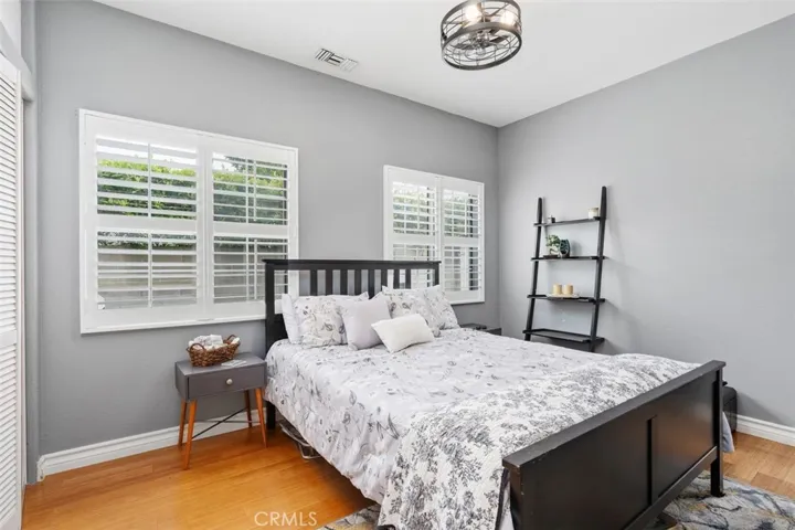 All bedrooms downstairs have dual paned windows and shutters.