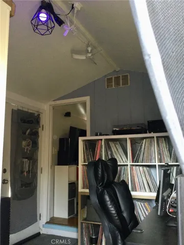 Possible office space/music studio as you walk in and also includes another space and bathroom