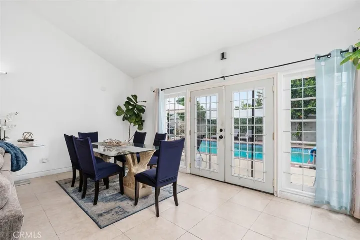 French doors..or envision upgrading to expansive wall-to-wall glass doors