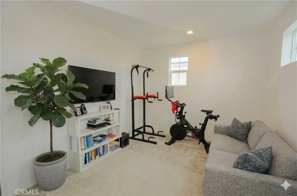 Loft area with AI staged sofa & tree