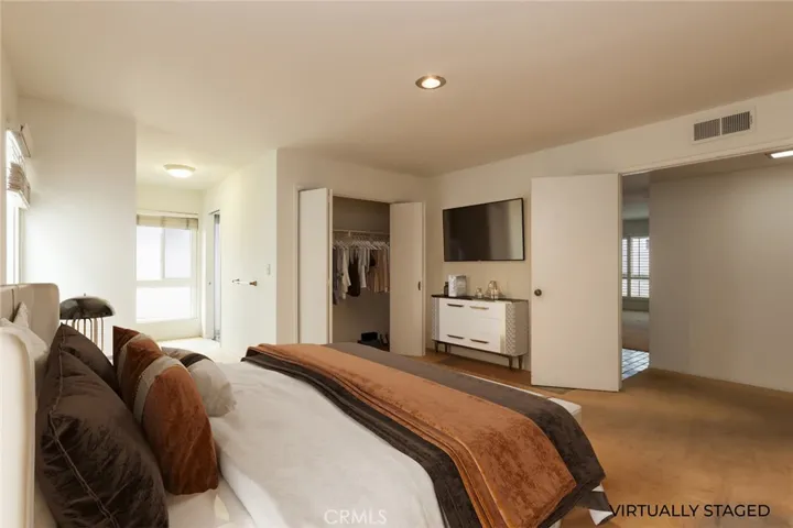 VIRTUALLY STAGED primary bedroom