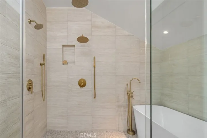 Primary Wet Room with stand alone Tub and Triple Shower