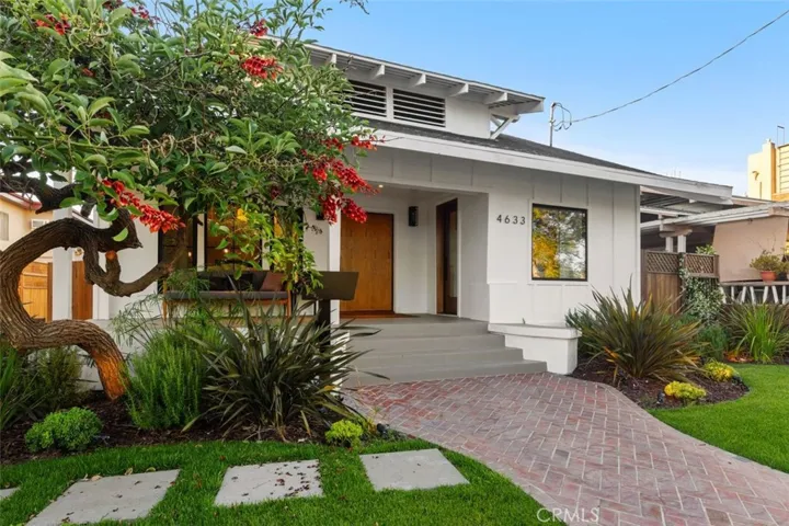 Front Garden walkway and porch with 2 doors. Main Entry and Office Reception area Entry