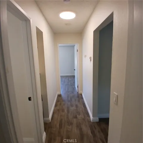 HALLWAY TO BEDROOMS AND BATHROOMS