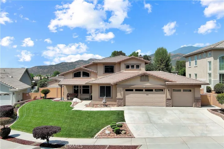 This meticulously-maintained home offers some surprising backyard upgrades, so be sure to check them out! It sits on a premium view lot nestled in the rolling hills of upper Yucaipa with mature oaks and a hiking trail out back and sidewalks out front for the best of both worlds.