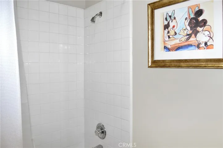 The 3rd Full Bath is on the Main Floor and Offers a Granite-Topped Vanity, Engineered Hardwood Flooring, New Lighting and a Tub/Shower Combo