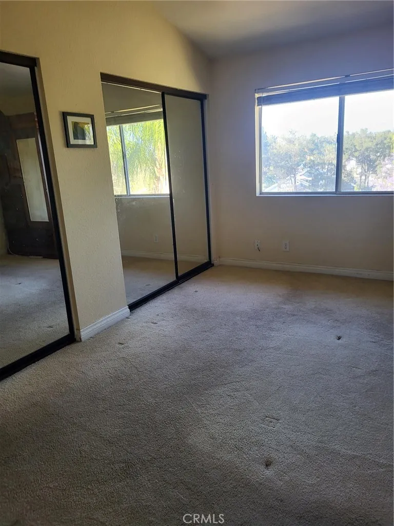 MASTER BEDROOM MIRROR CLOSETS