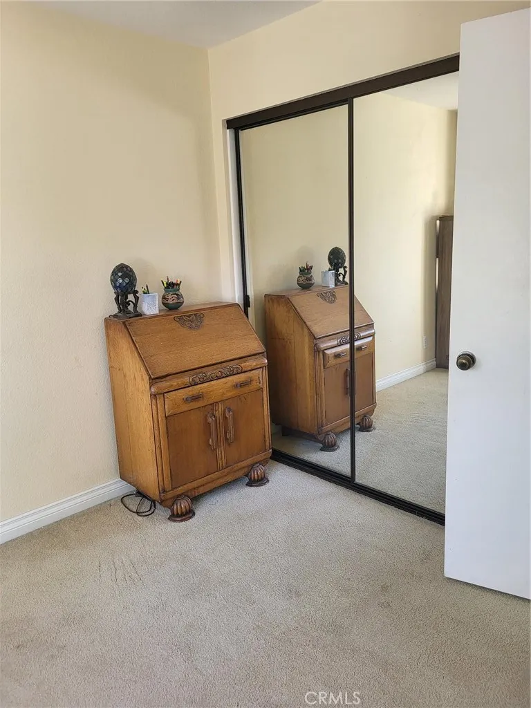 SMALLER BEDROOM