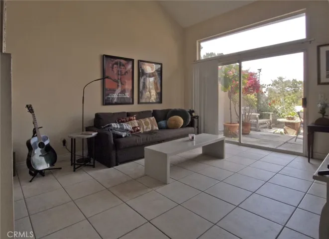 LIVING ROOM AREA WITH PATIO SLIDING DOORS