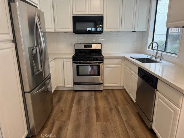 Kitchen with all stainless steel appliances