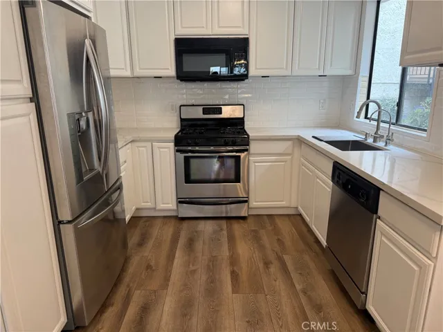 Kitchen with all stainless steel appliances