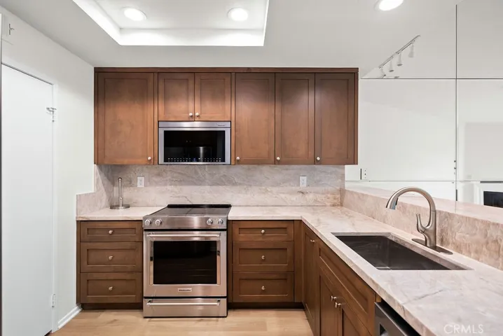 NEWLY REMODELED KITCHEN WITH BAR COUNTER