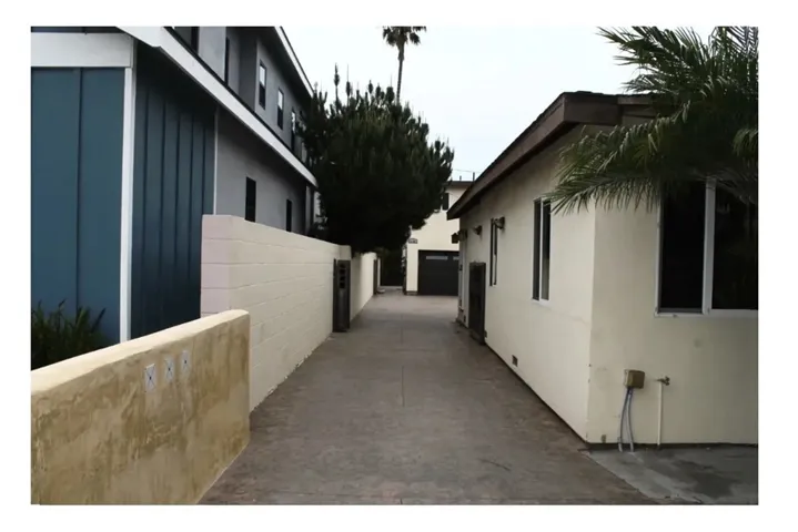 driveway leading to back unit