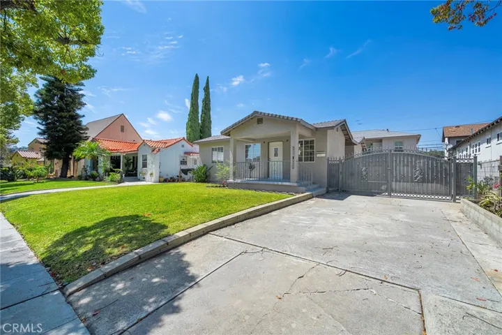 Driveway, right side house.