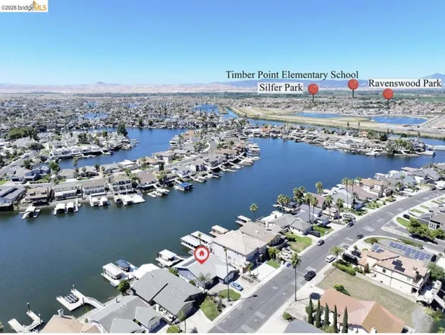 Waterfront property featuring an extended private dock