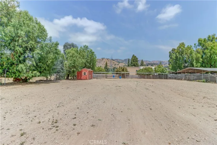 Horse stalls and tack/feed shed view from picnic area.