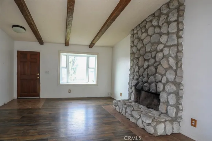 Entry door/living room/fireplace