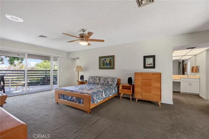 Master wing with personal patios/balcony and right behind this wall is the closet corridor