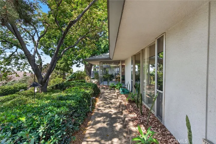 walkway to front from carport and driveway